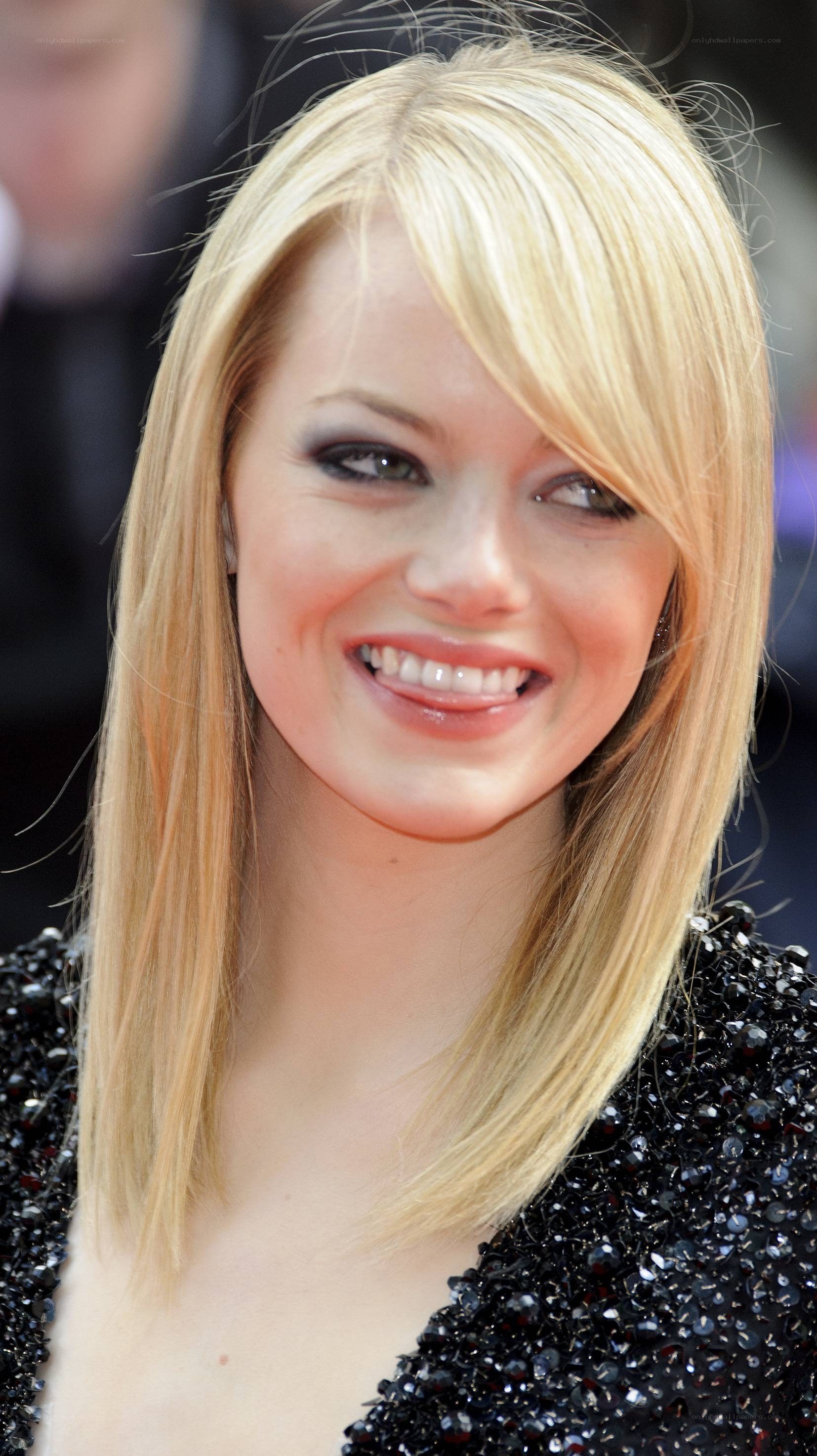 Emma Stone smiling at event