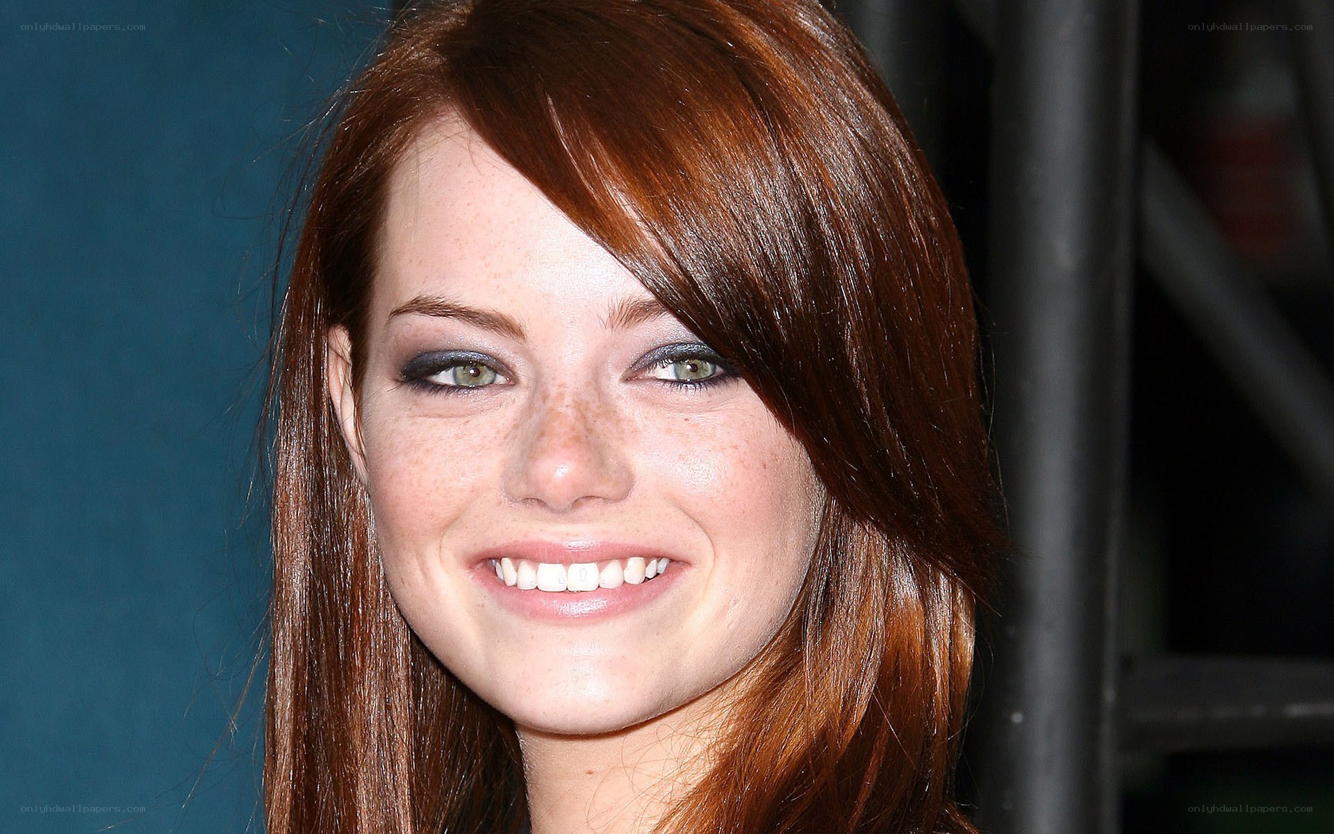 Emma Stone smiling at event