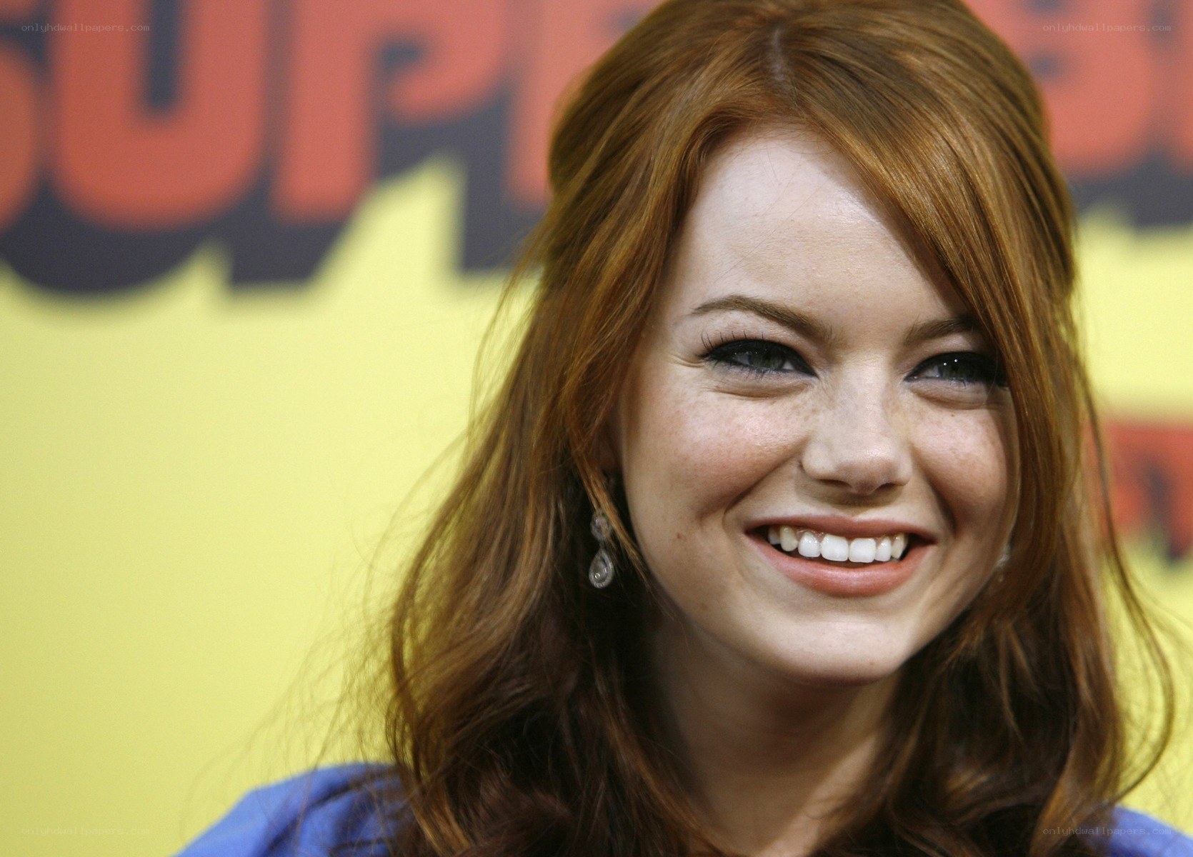 Emma Stone smiling at event