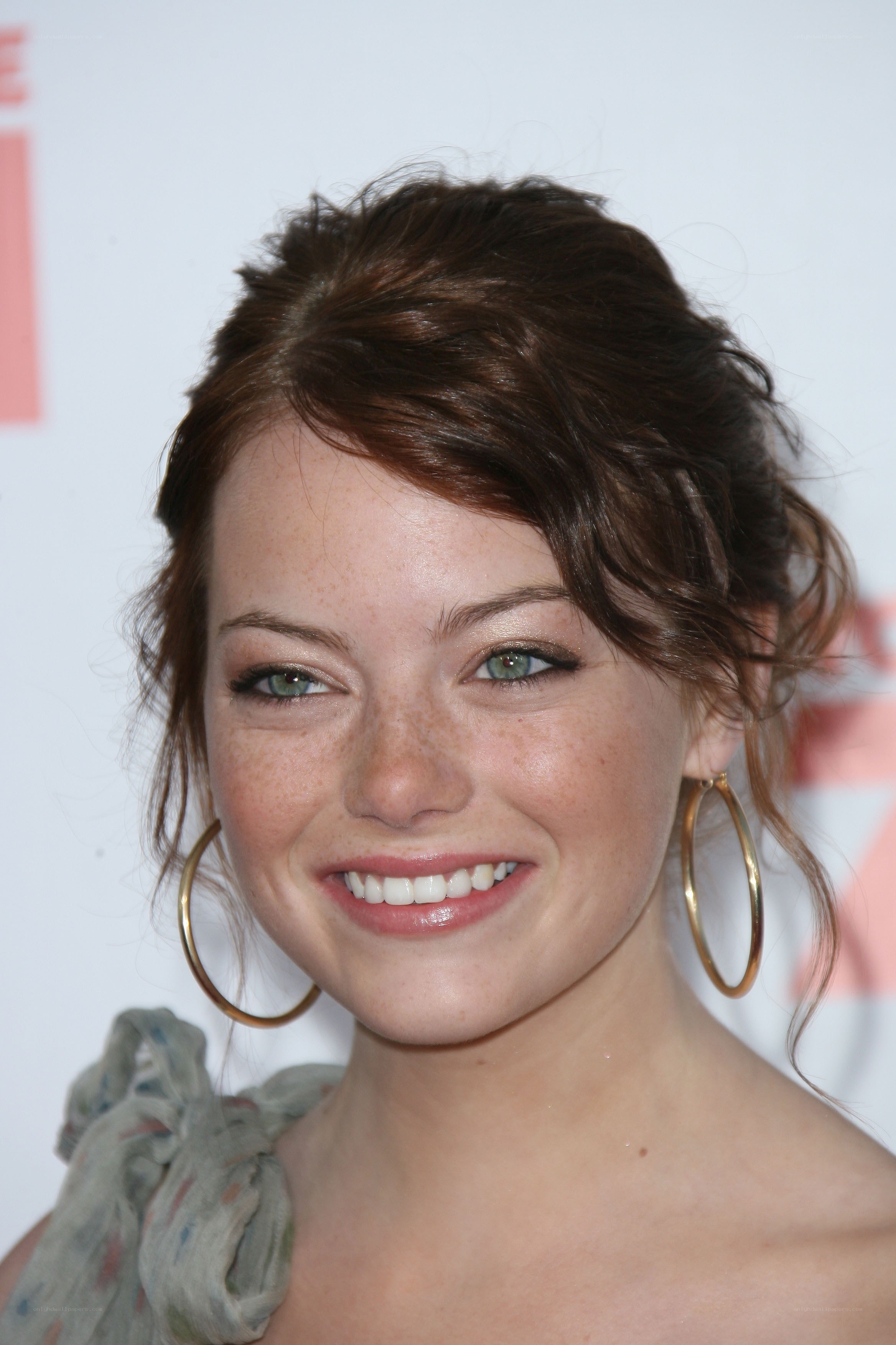 Emma Stone smiling at event