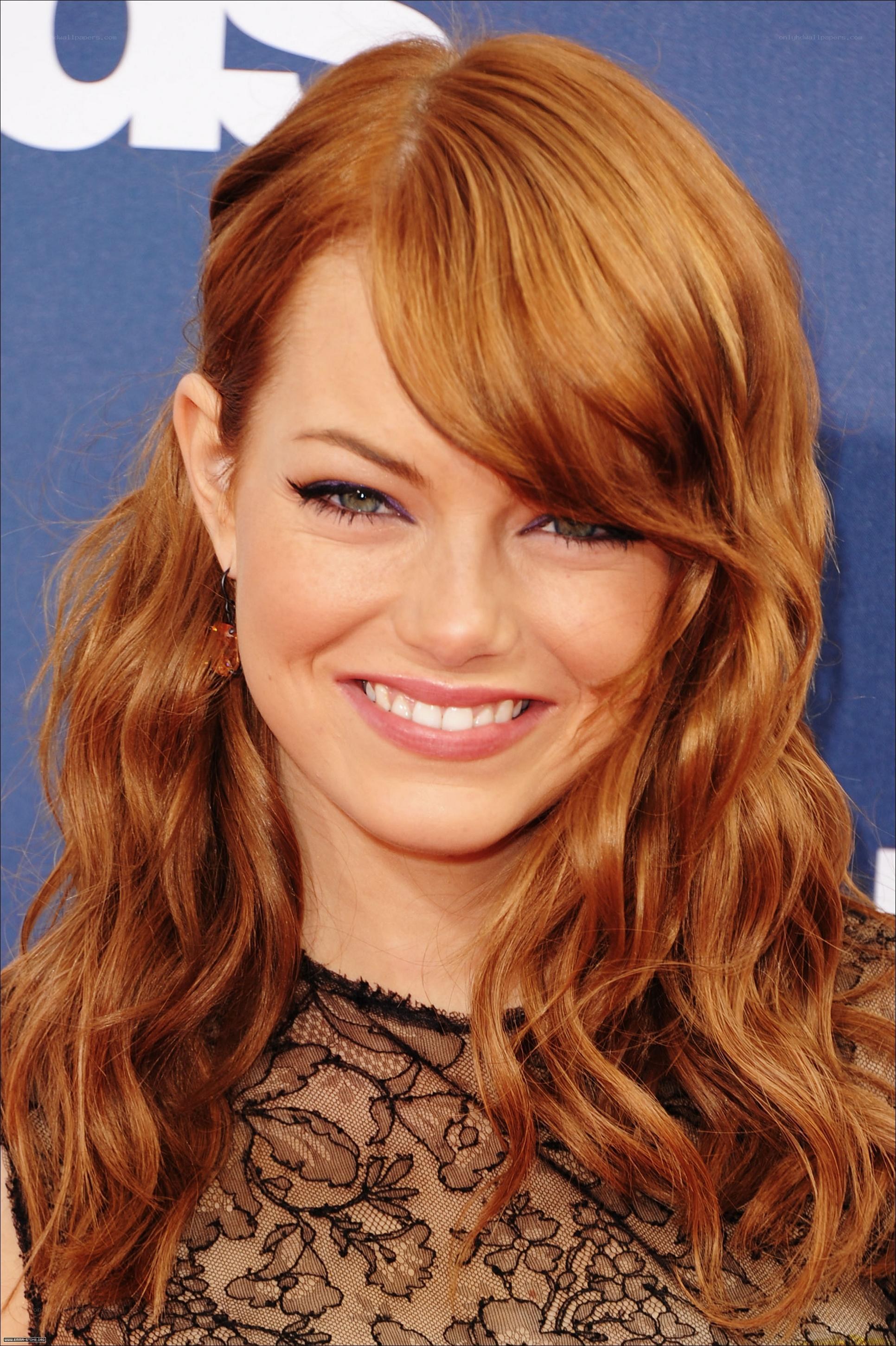 Emma Stone smiling at event