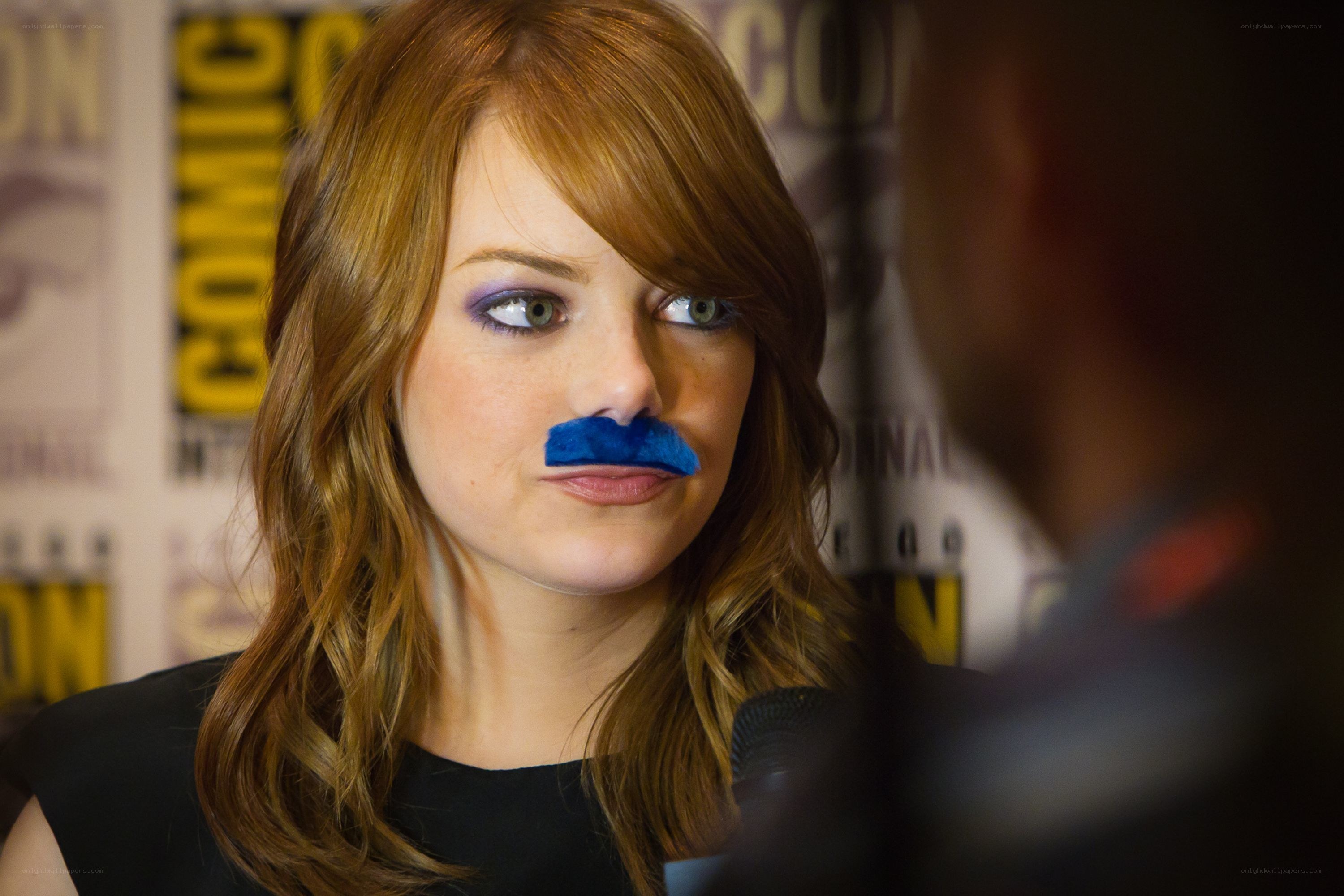 Emma Stone with blue mustache