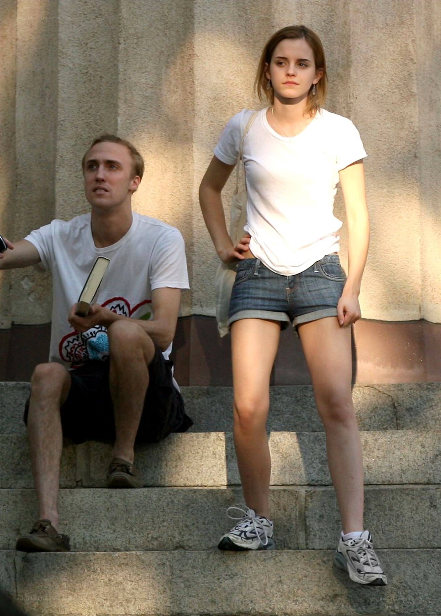 Emma Watson and a man on steps