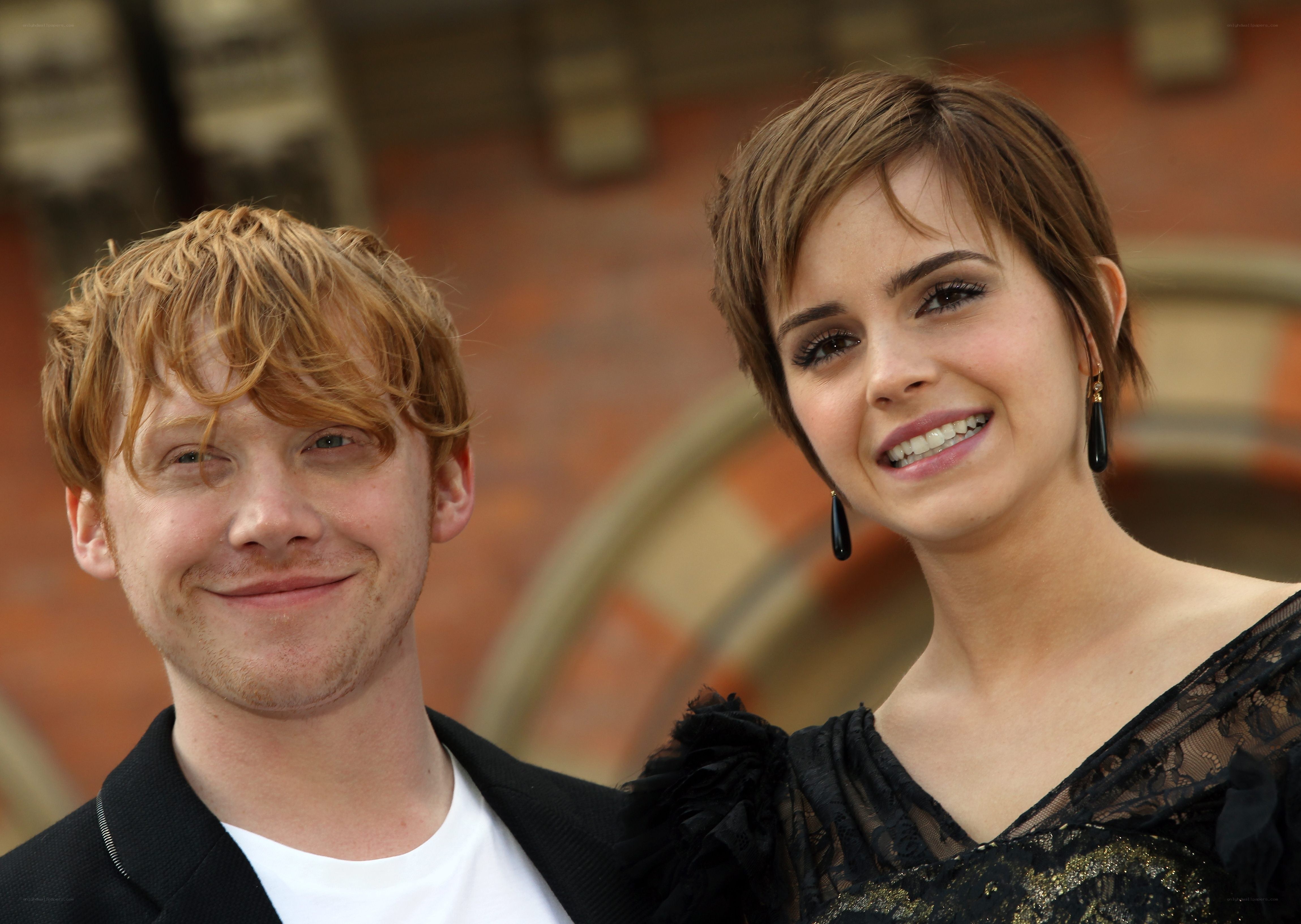 Emma Watson and Rupert Grint smile