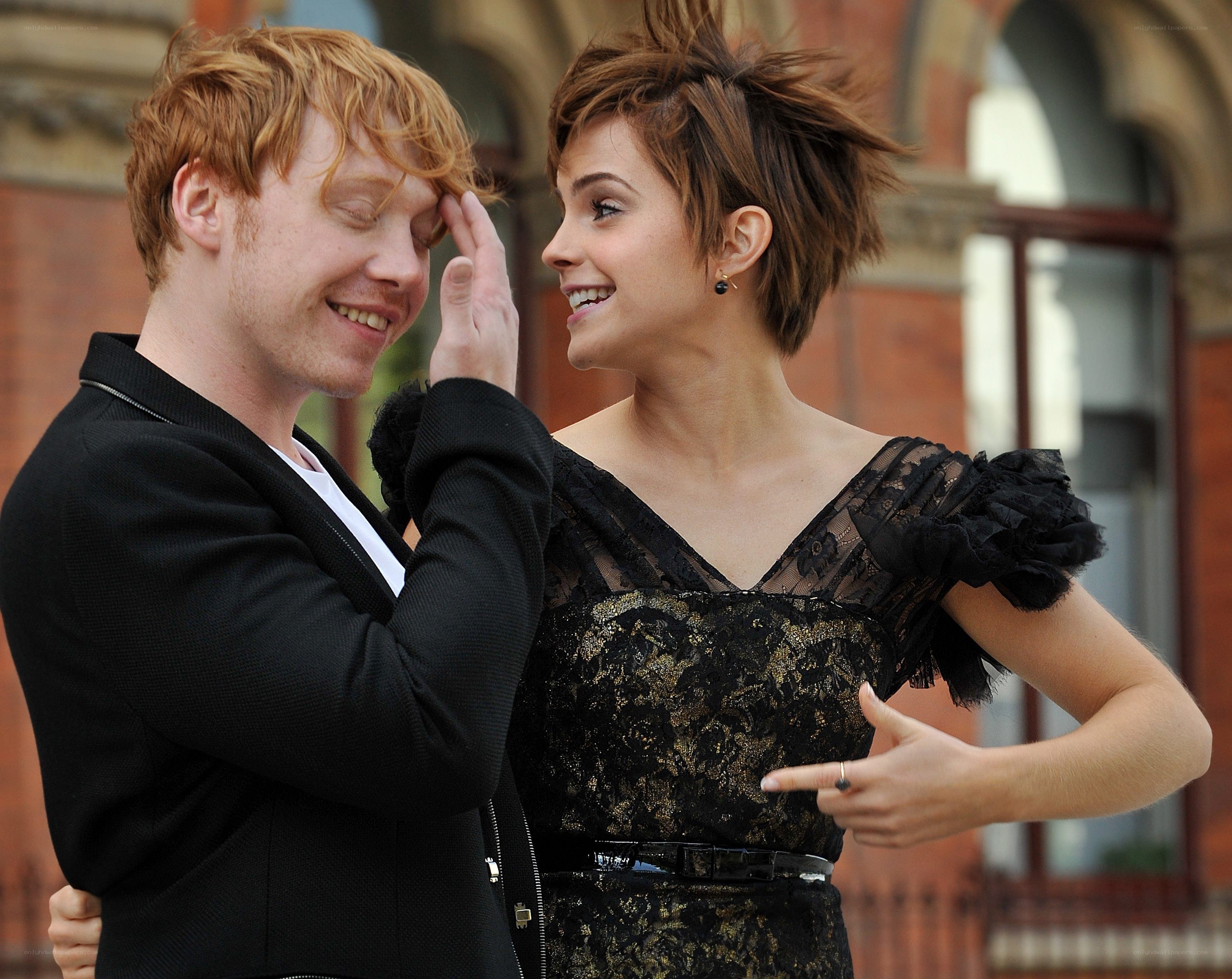 Emma Watson and Rupert Grint smiling