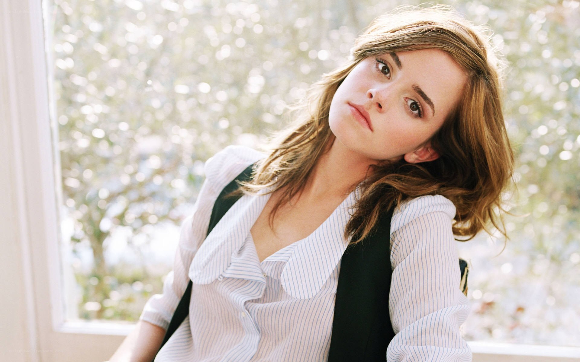 Emma Watson by window