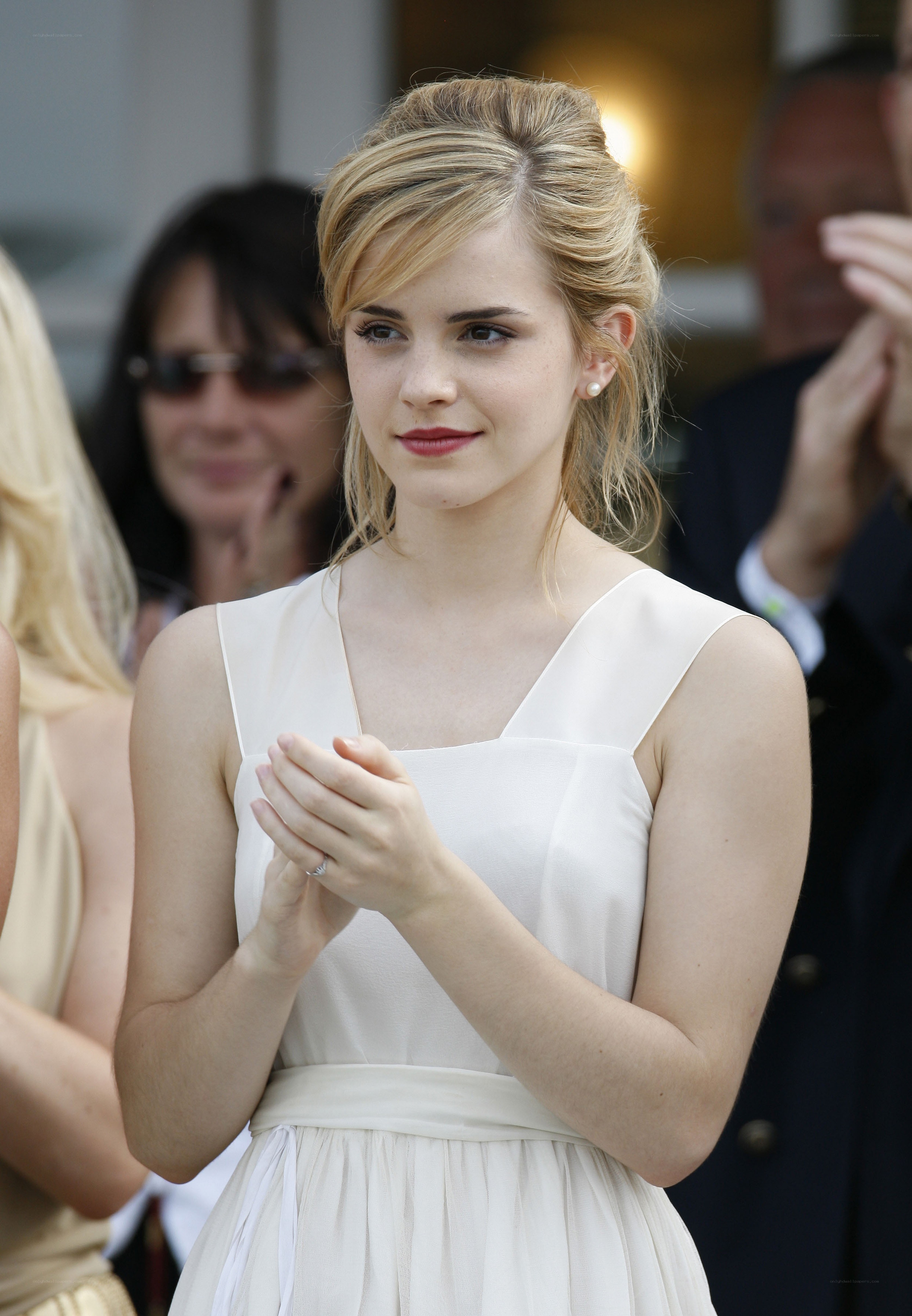 Emma Watson clapping at event