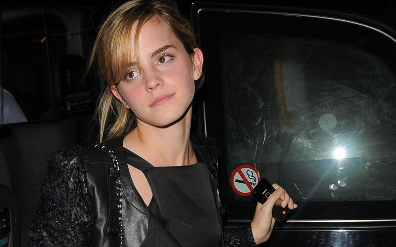 Emma Watson exiting a car