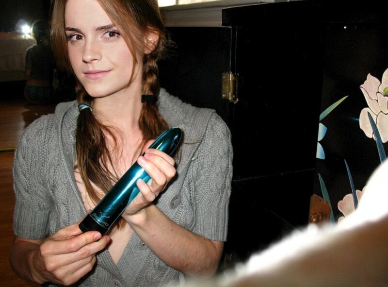 Emma Watson holding a hairbrush