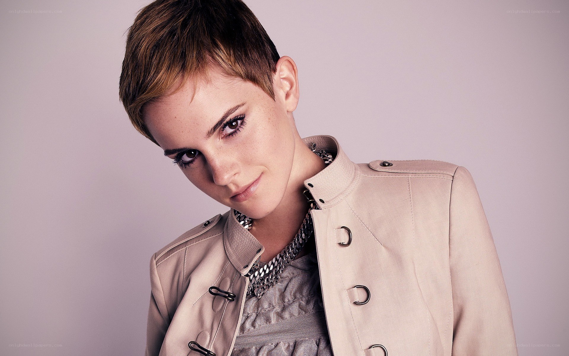 Emma Watson in a beige jacket
