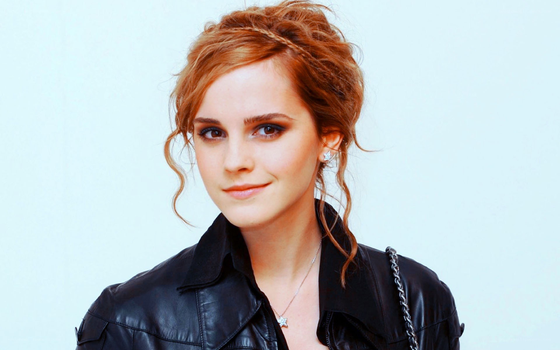 Emma Watson in a black leather jacket