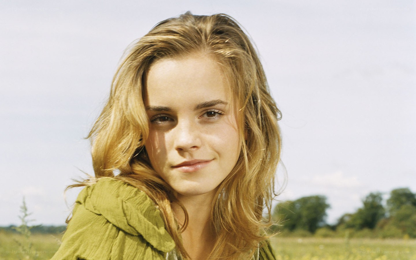 Emma Watson in a field