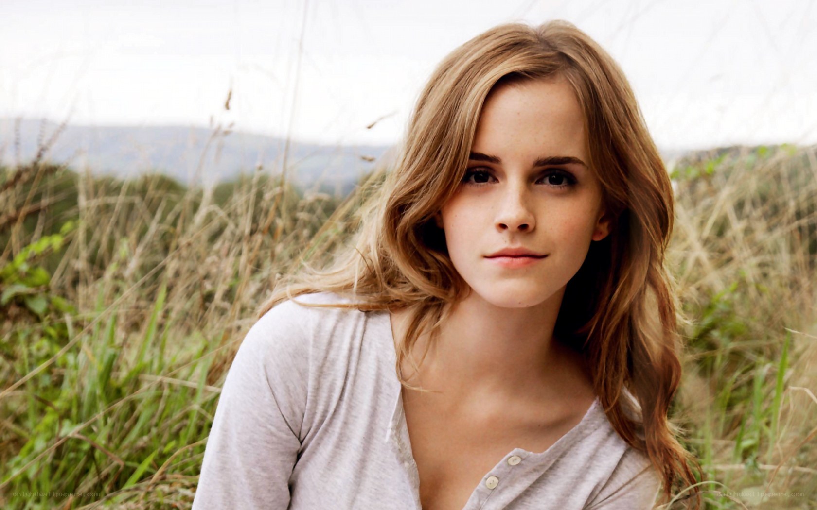 Emma Watson in a field