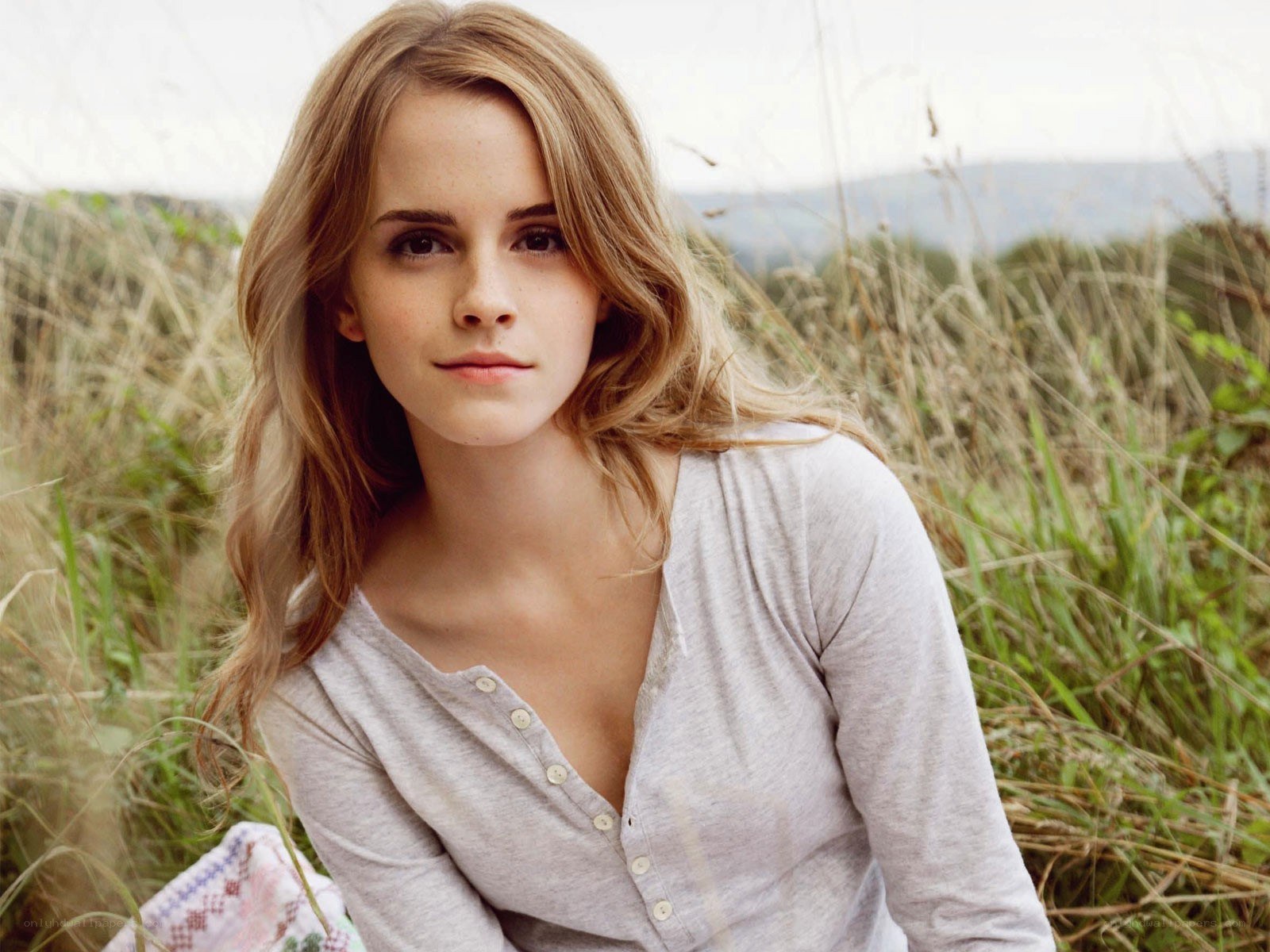 Emma Watson in a field