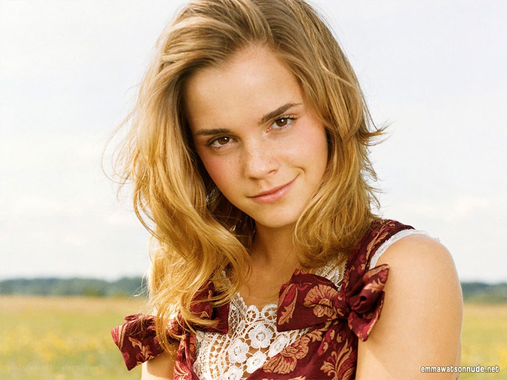 Emma Watson in a field