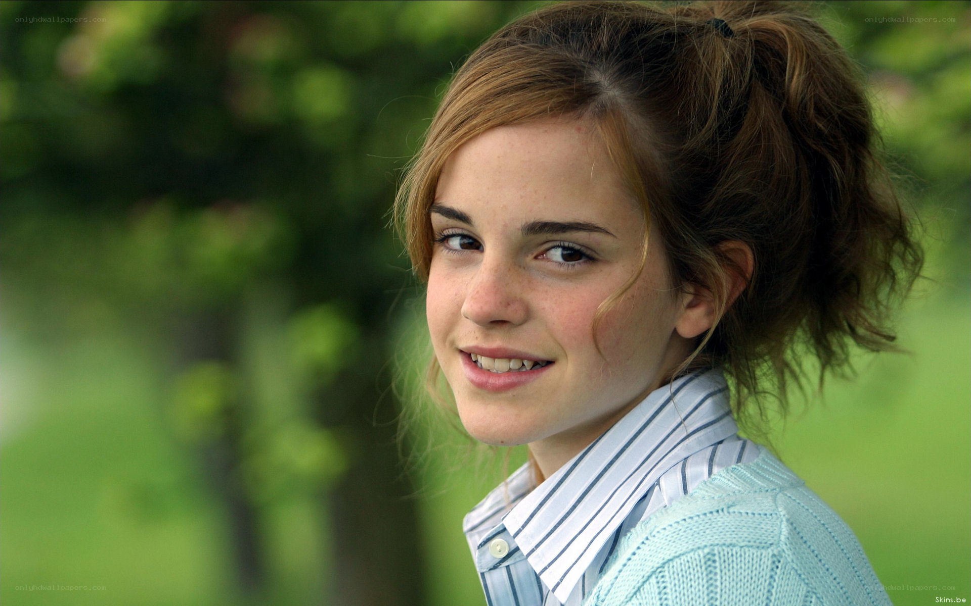 Emma Watson in a park