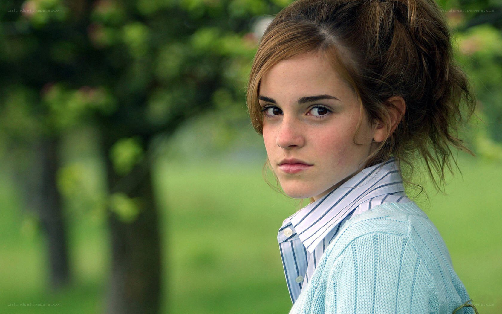 Emma Watson in a park
