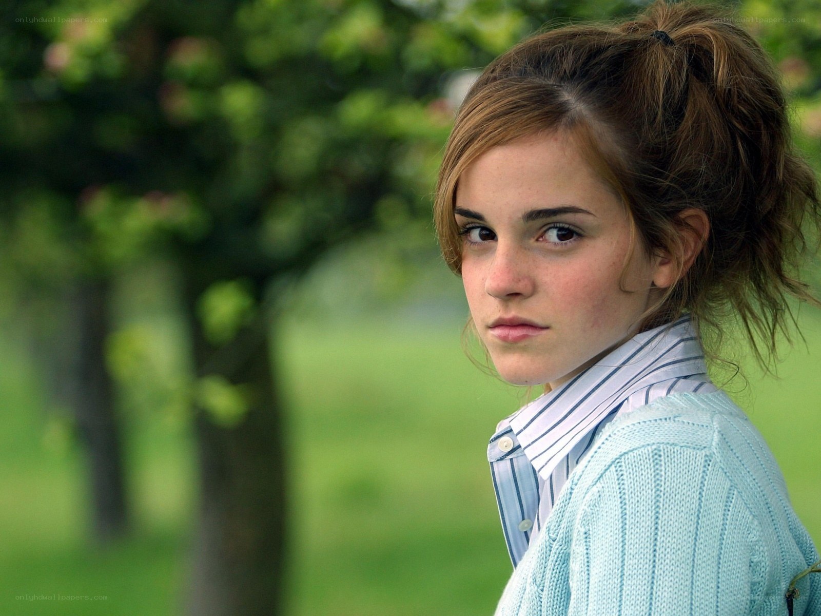 Emma Watson in a park