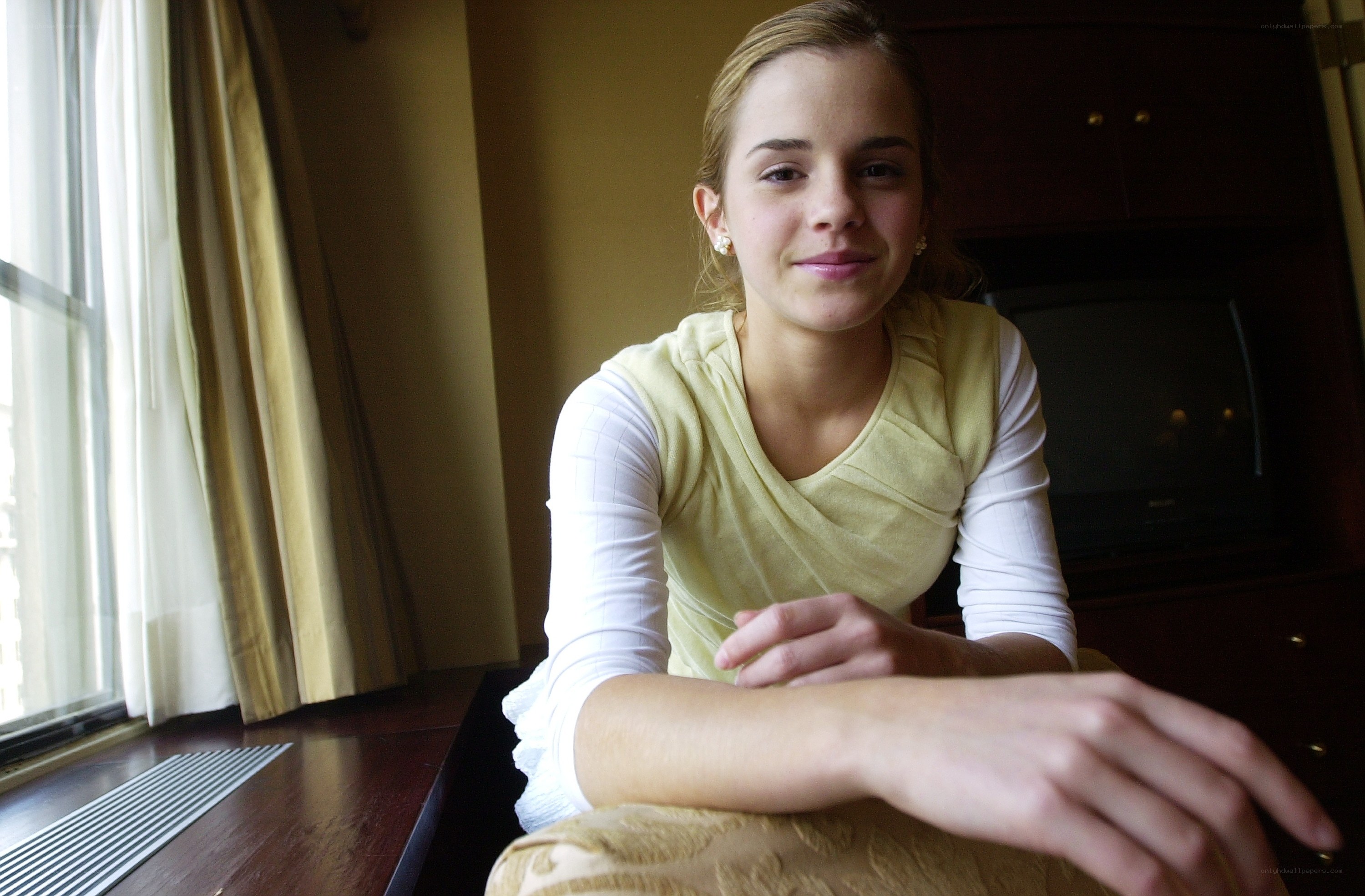 Emma Watson in a yellow top