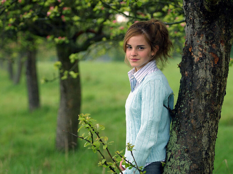 Emma Watson in an orchard