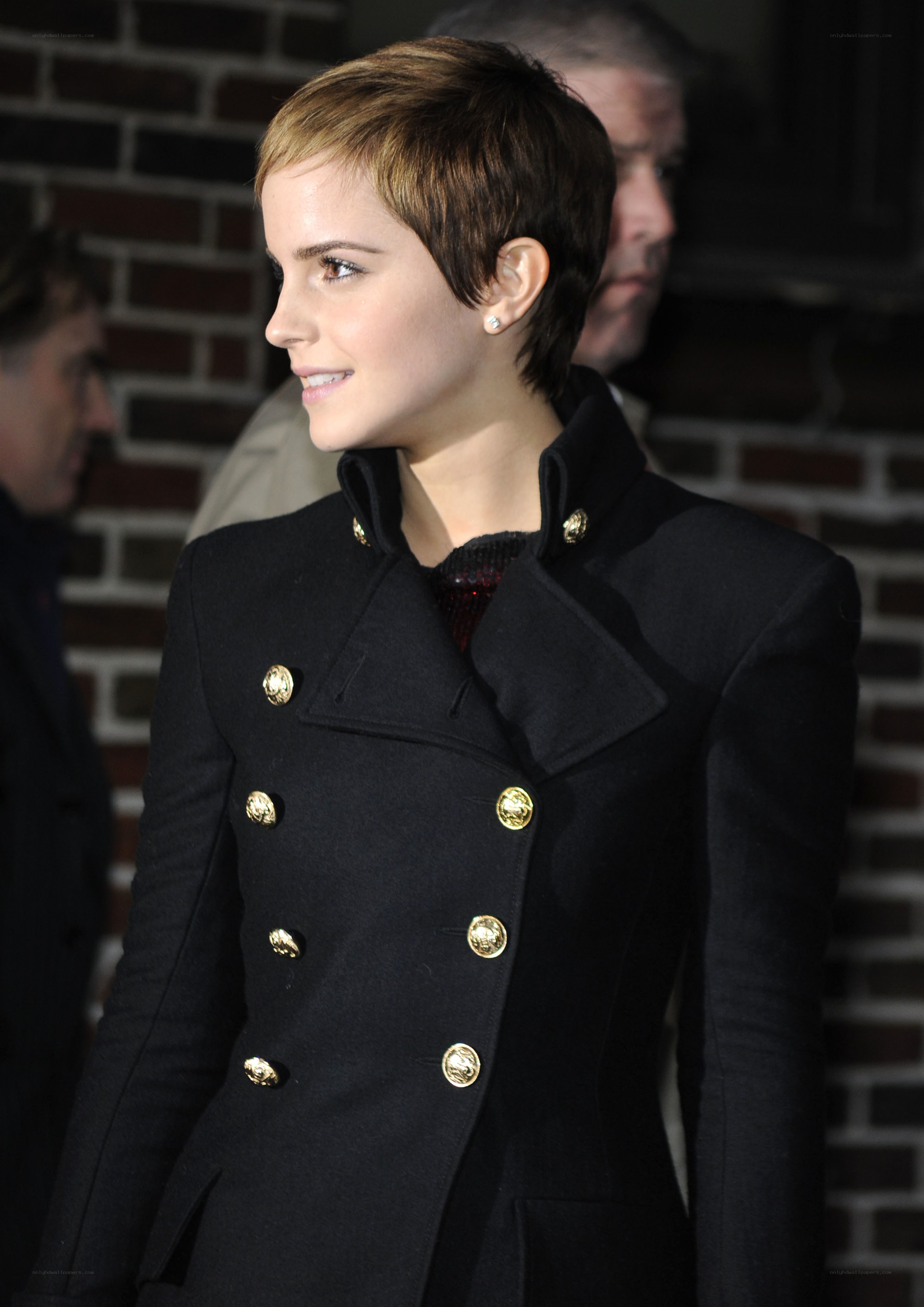 Emma Watson in black coat