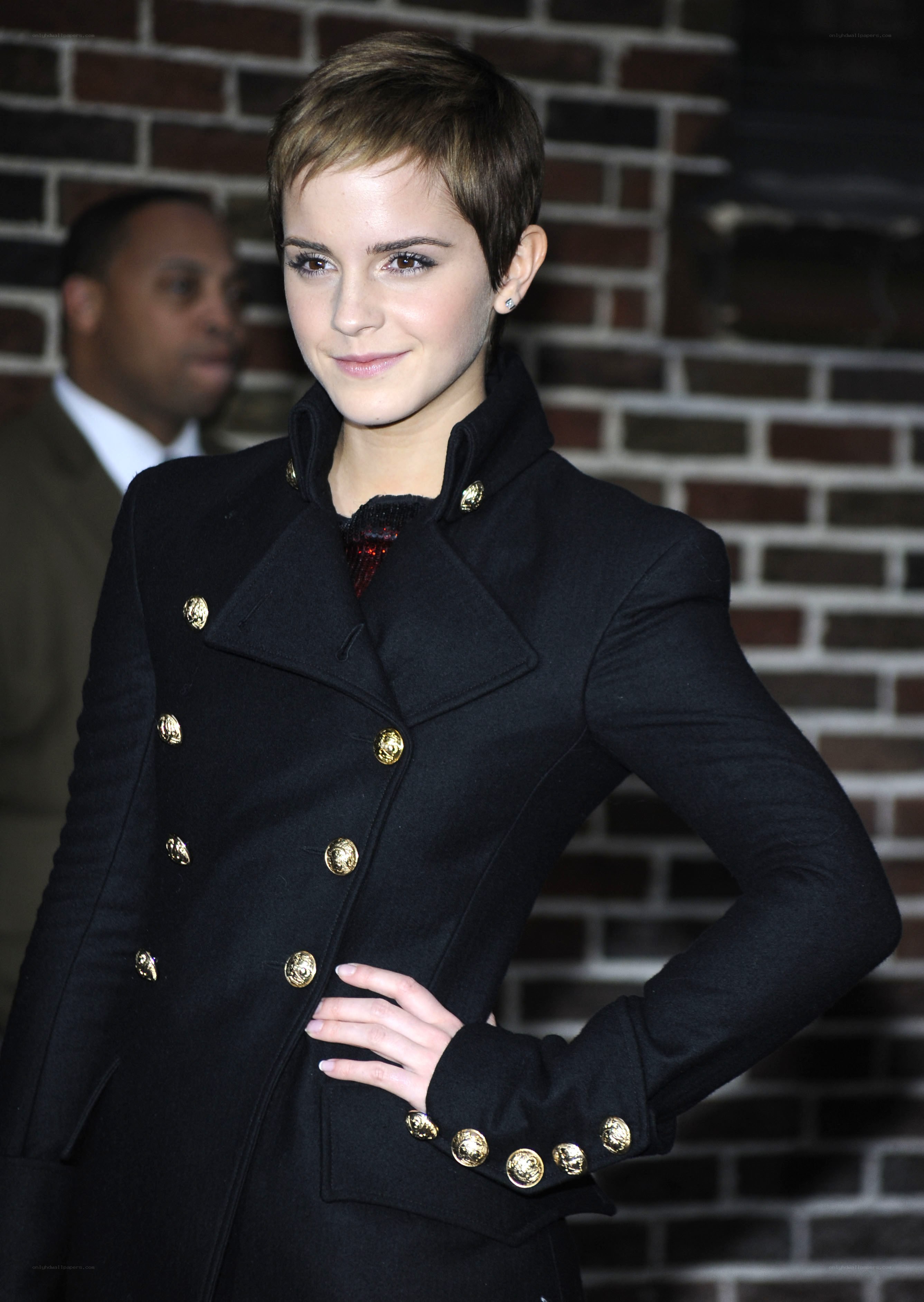 Emma Watson in black coat