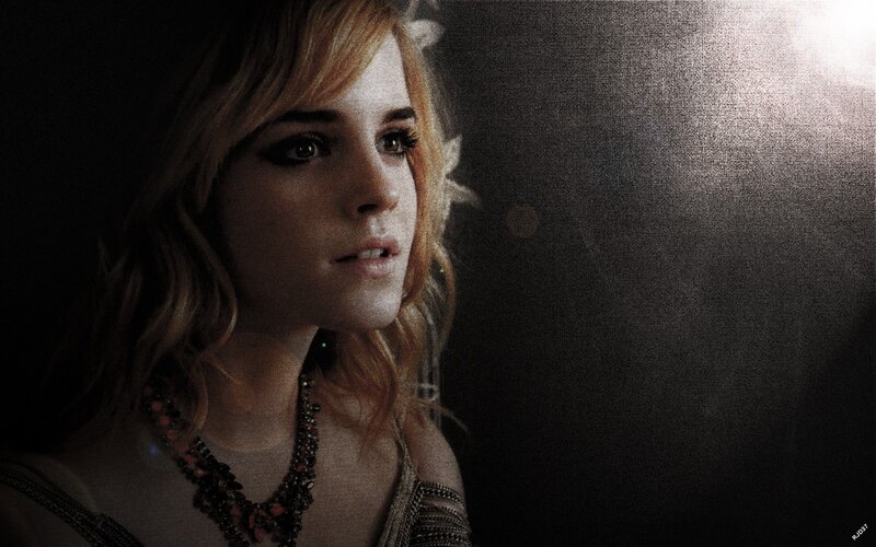 Emma Watson in dark lighting