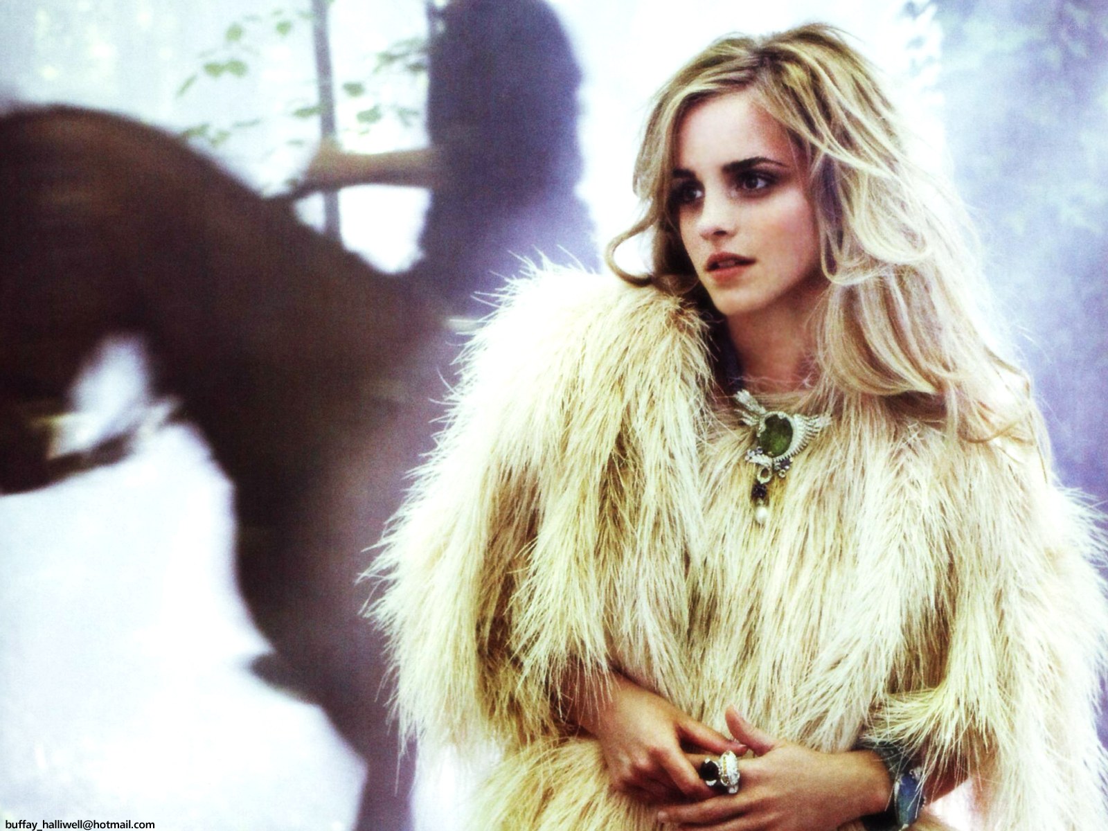 Emma Watson in fur coat