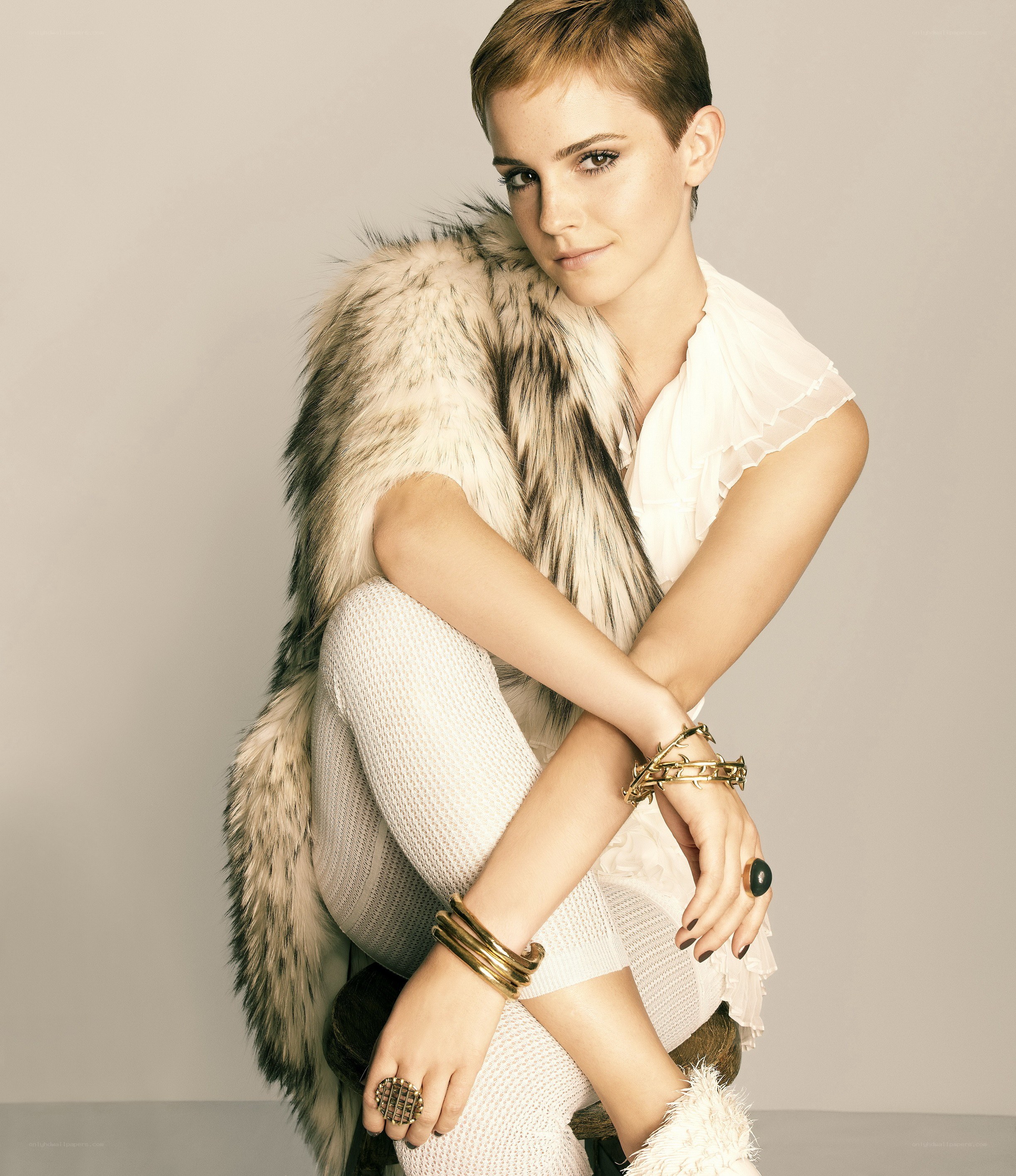 Emma Watson in fur vest