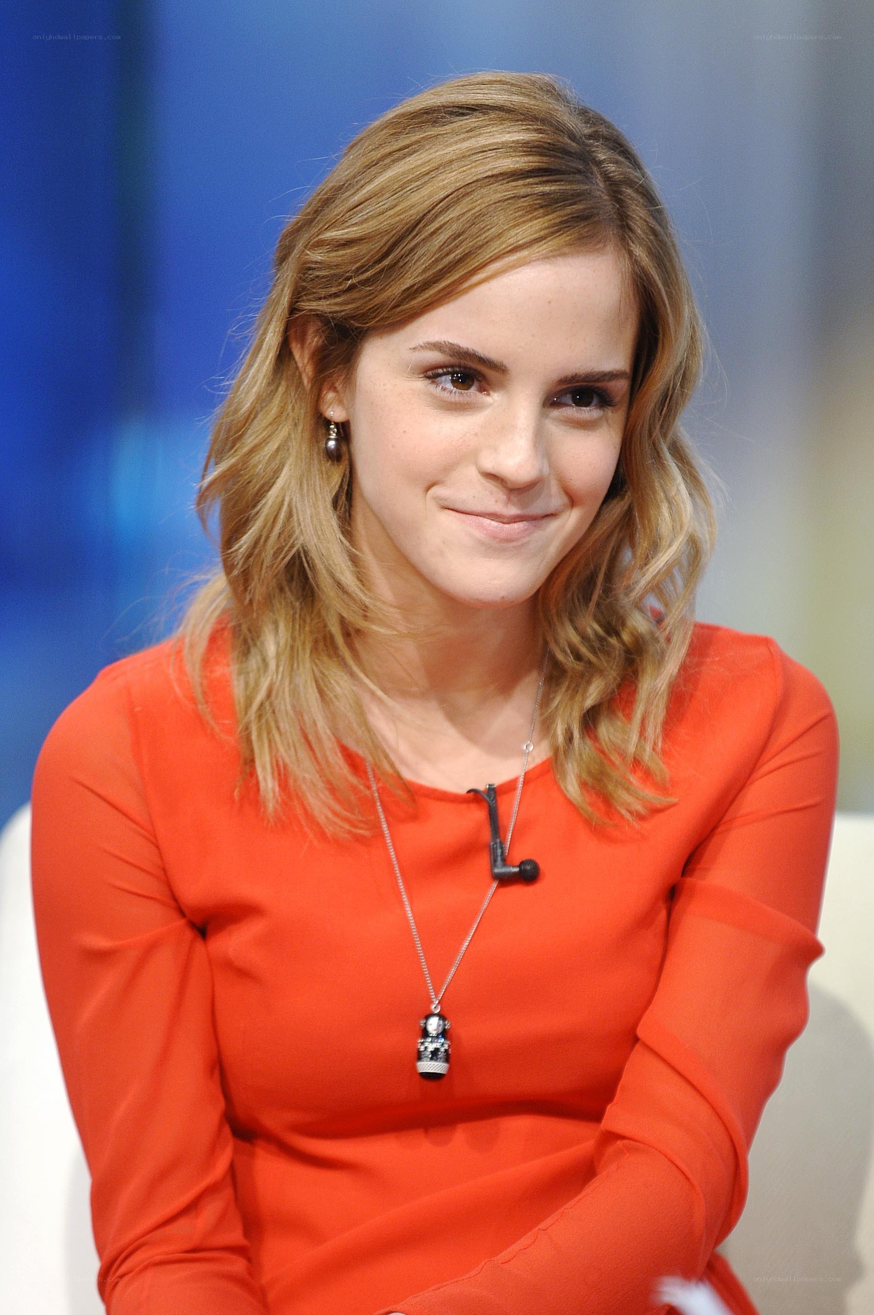 Emma Watson in orange dress