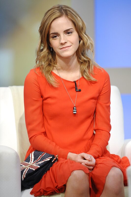 Emma Watson in orange dress