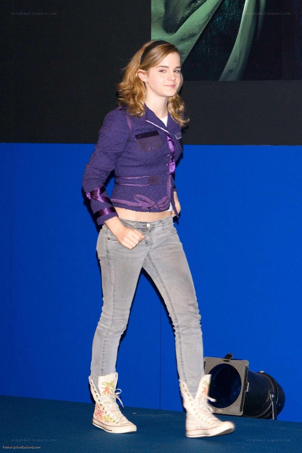 Emma Watson in purple jacket