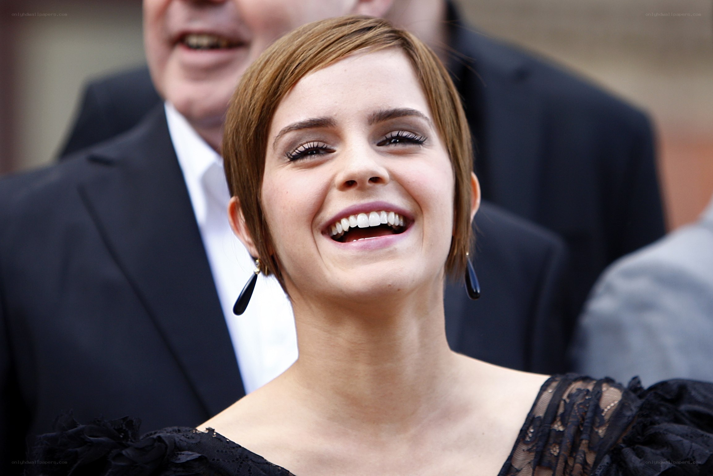 Emma Watson laughing at event