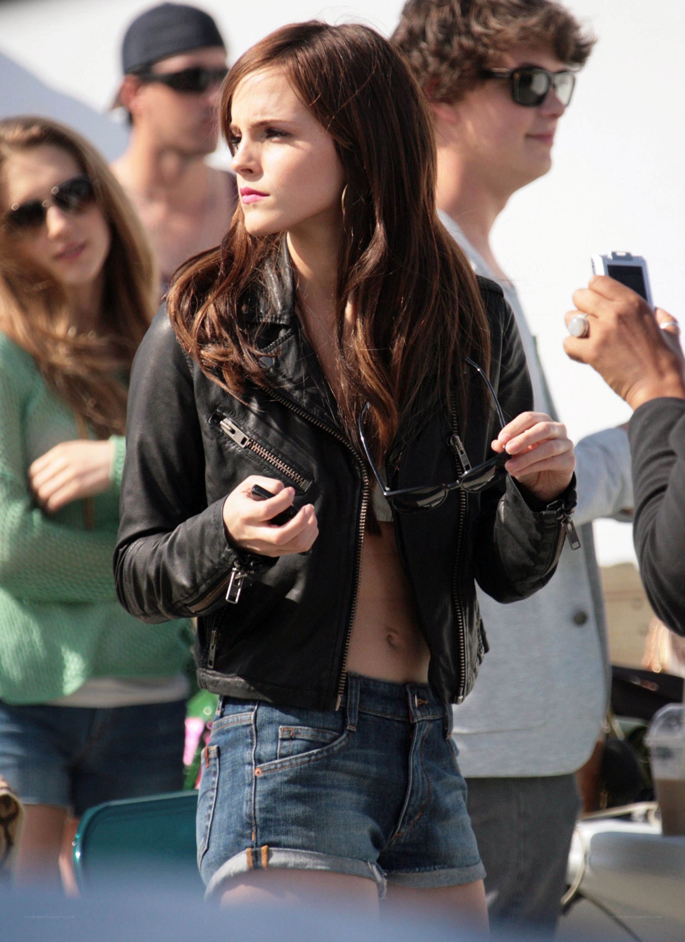 Emma Watson on set in leather jacket