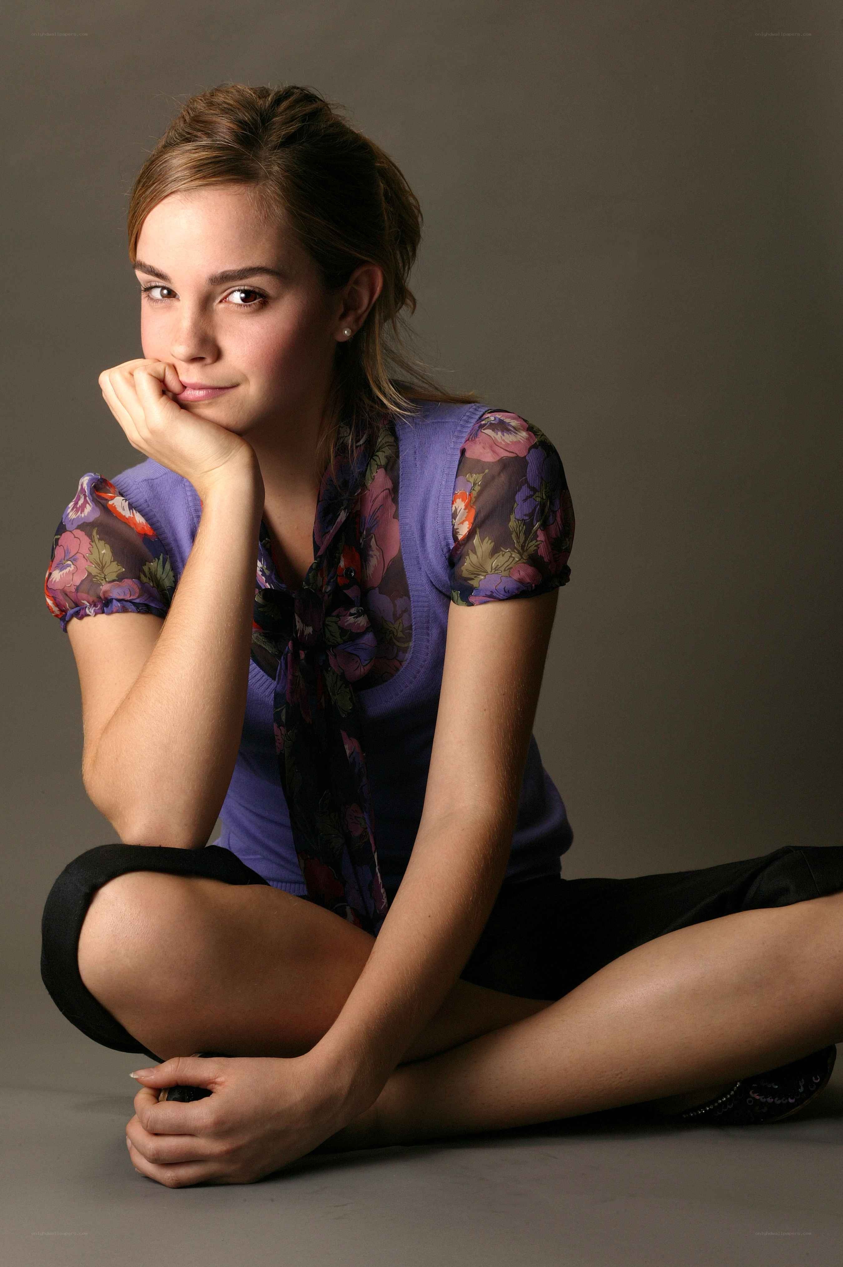 Emma Watson posing on floor