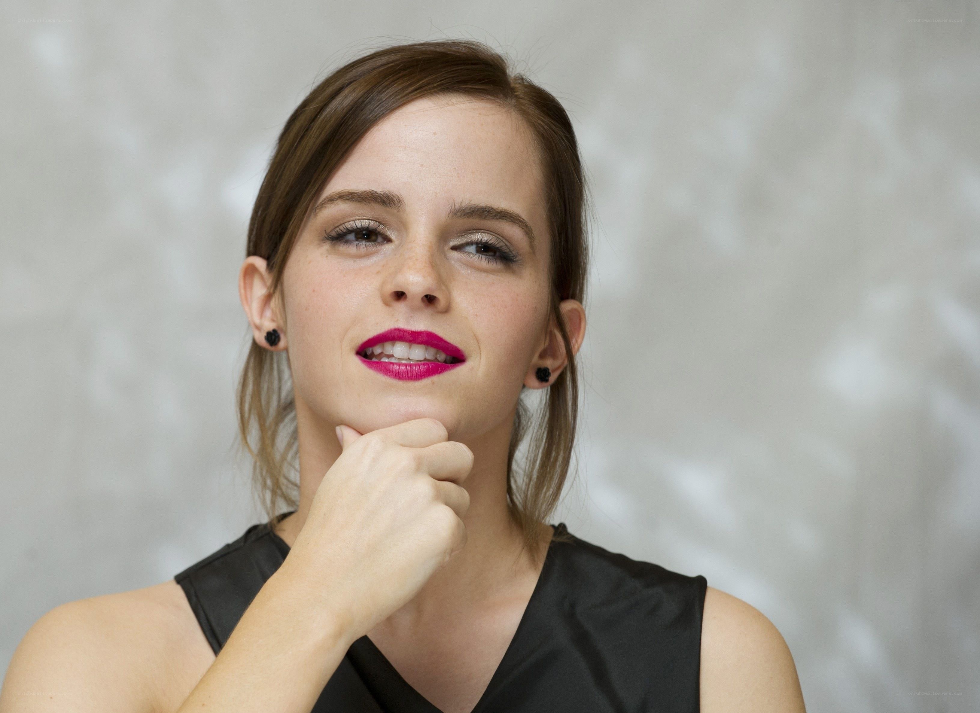 Emma Watson posing with hand on chin
