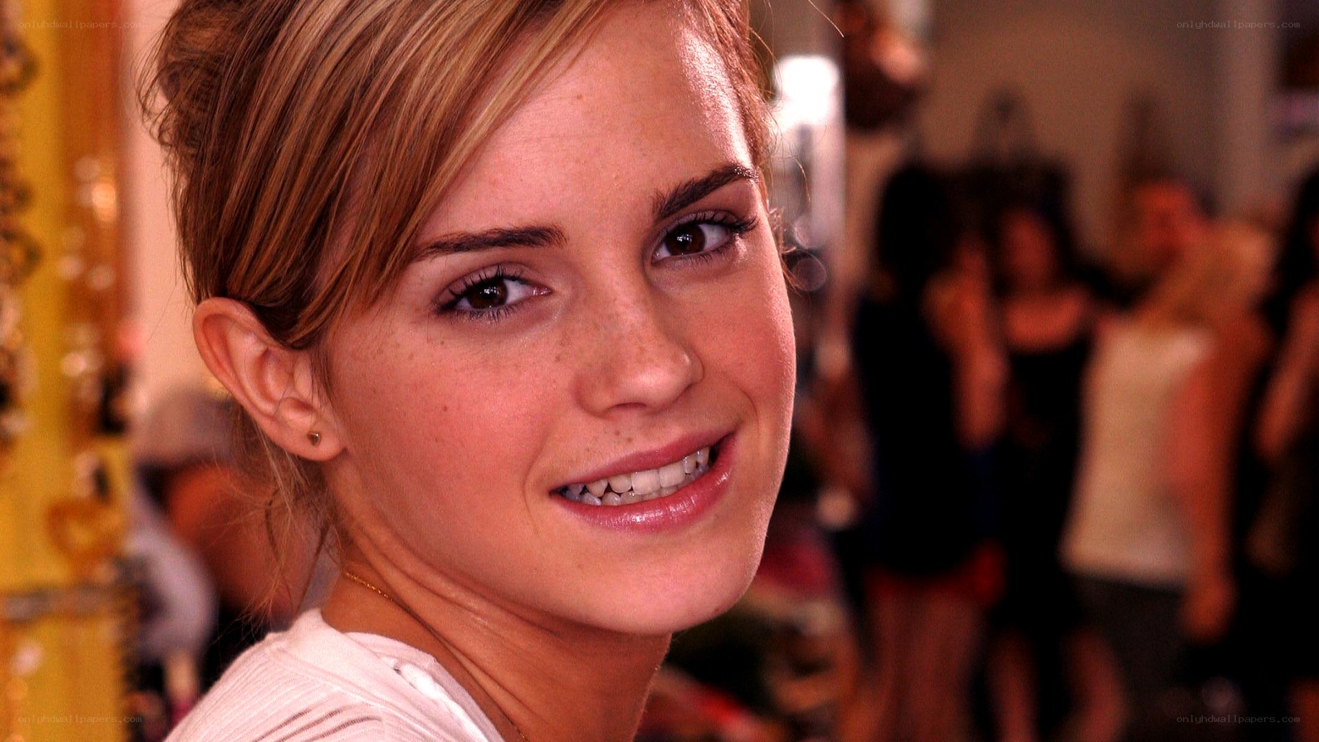 Emma Watson smiling at event