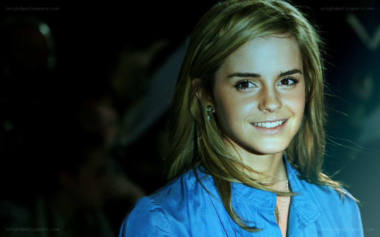 Emma Watson smiling at event