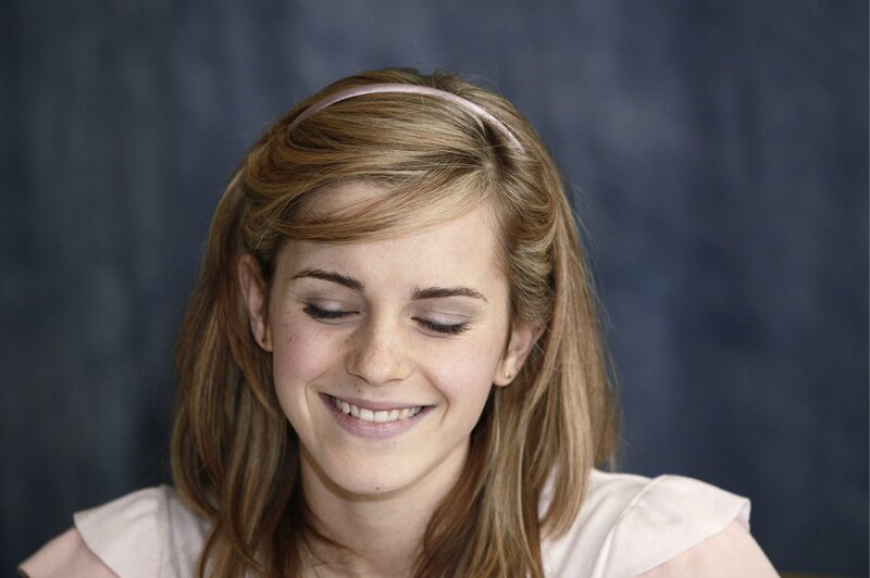 Emma Watson smiling at event