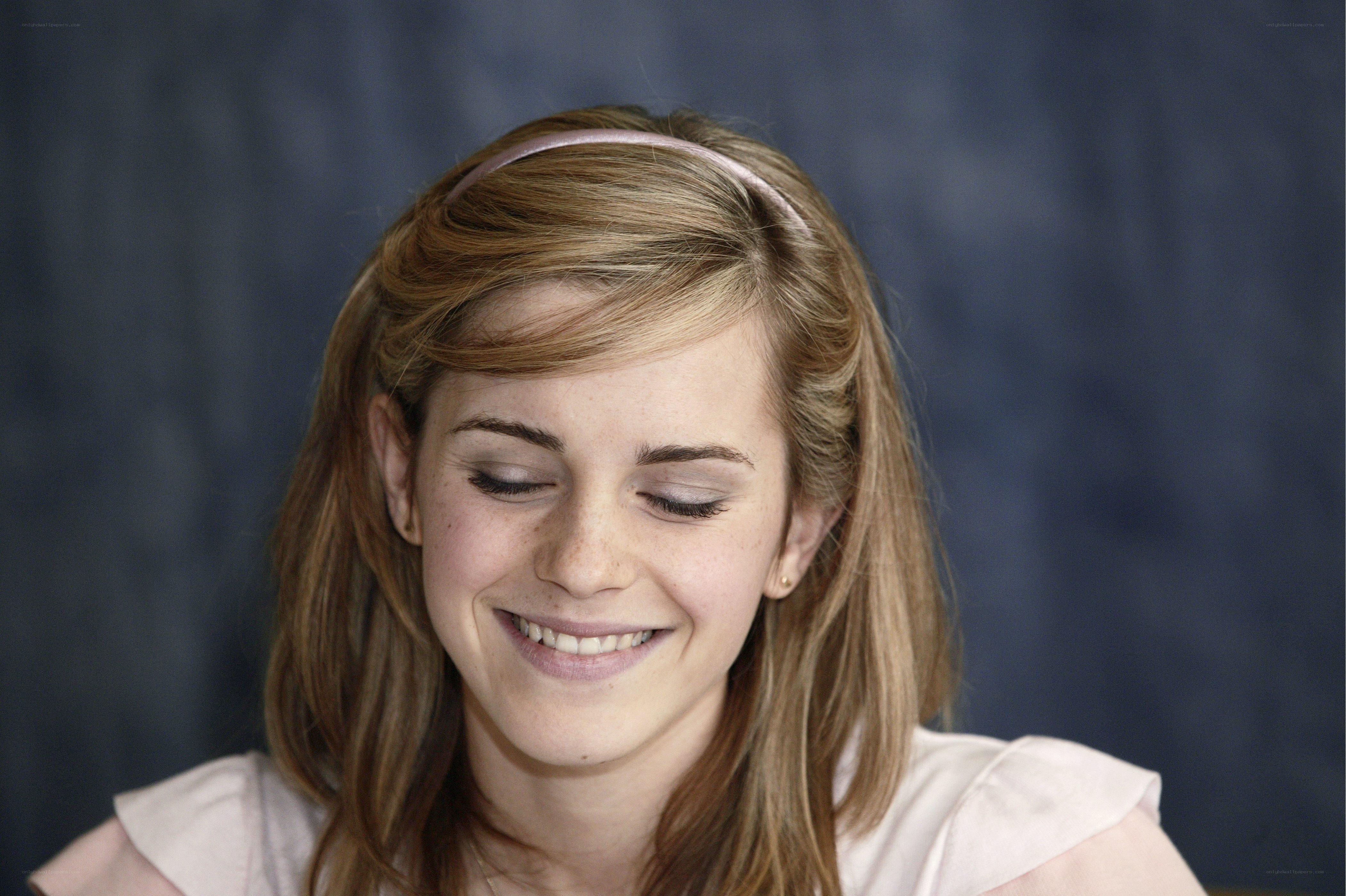 Emma Watson smiling at event