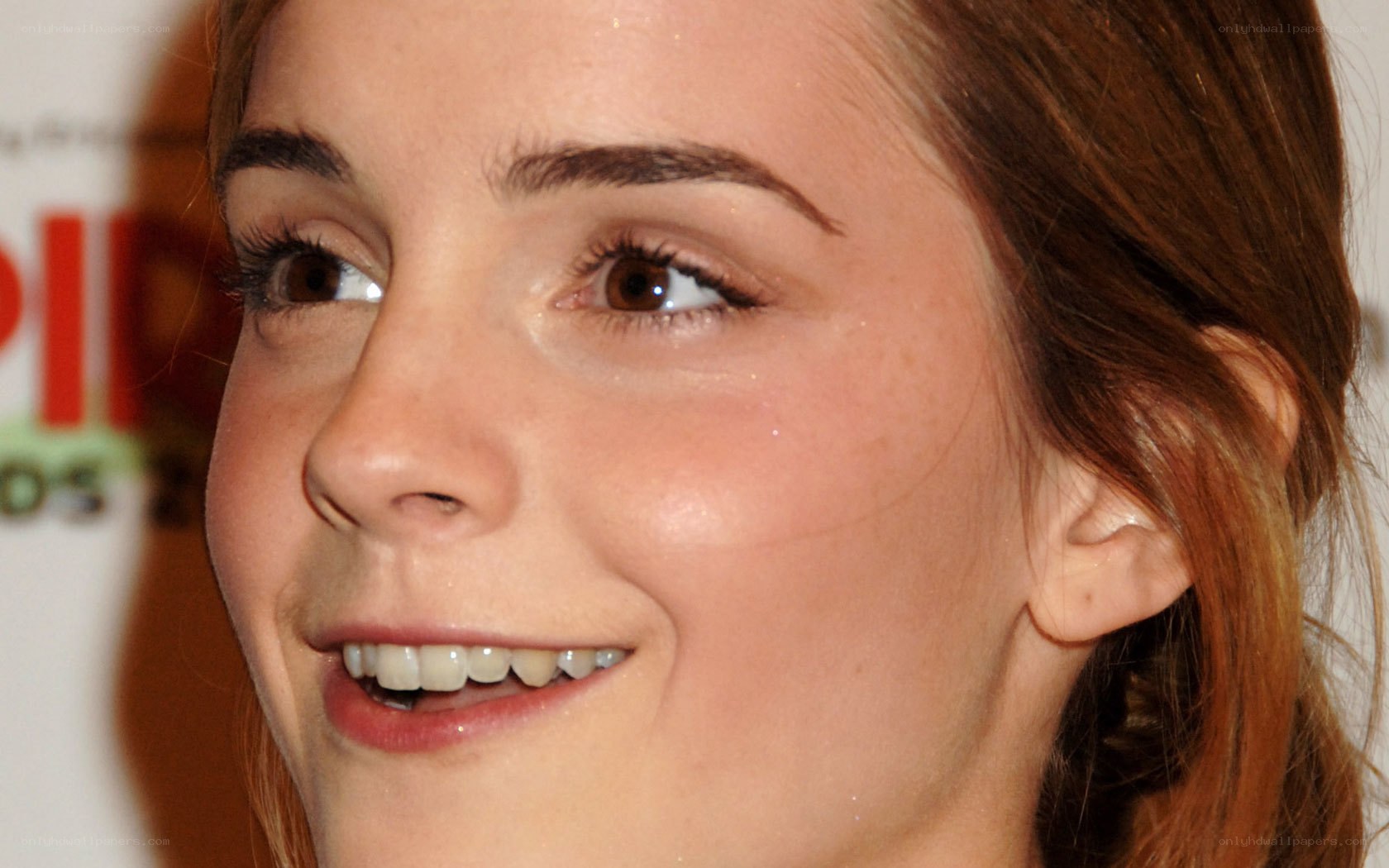 Emma Watson smiling at event