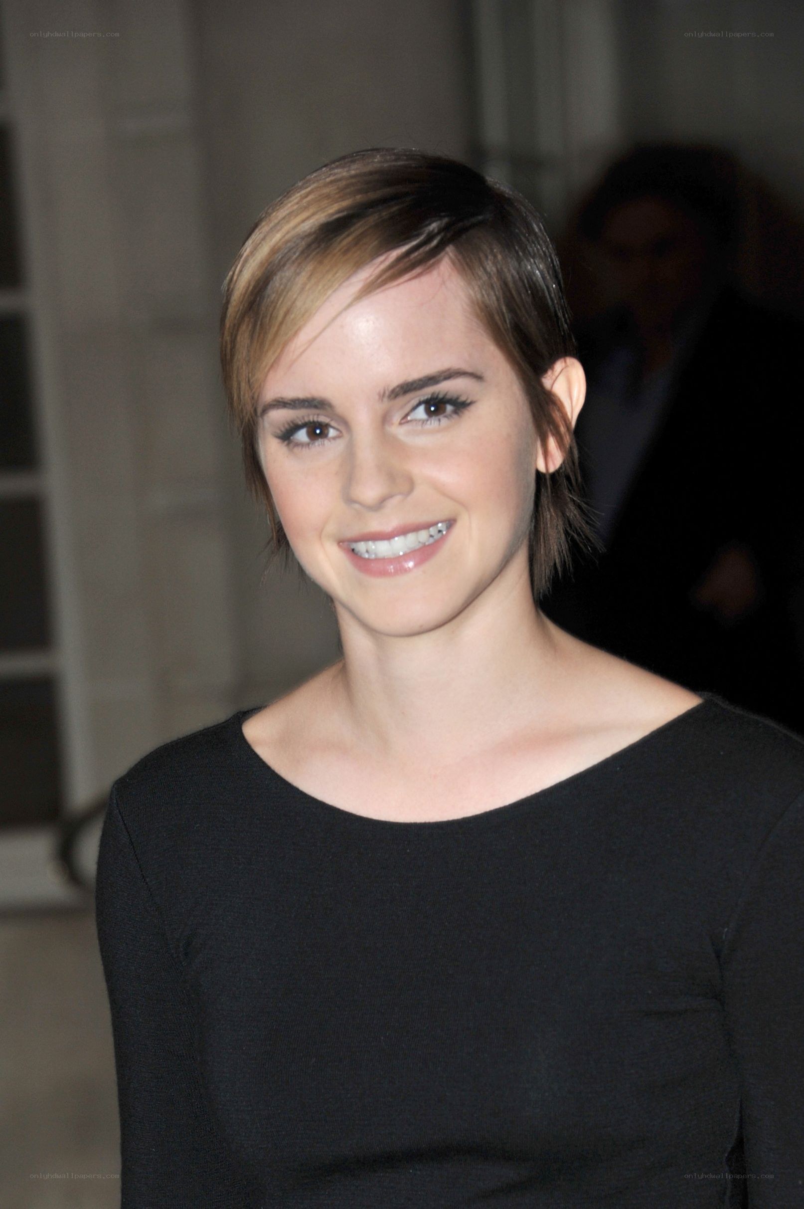 Emma Watson smiling at event