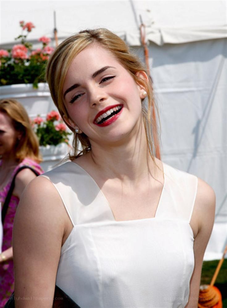 Emma Watson smiling at event