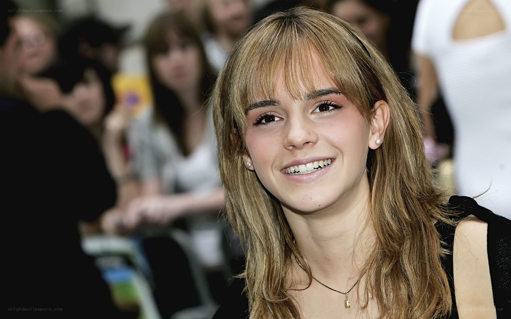 Emma Watson smiling at event