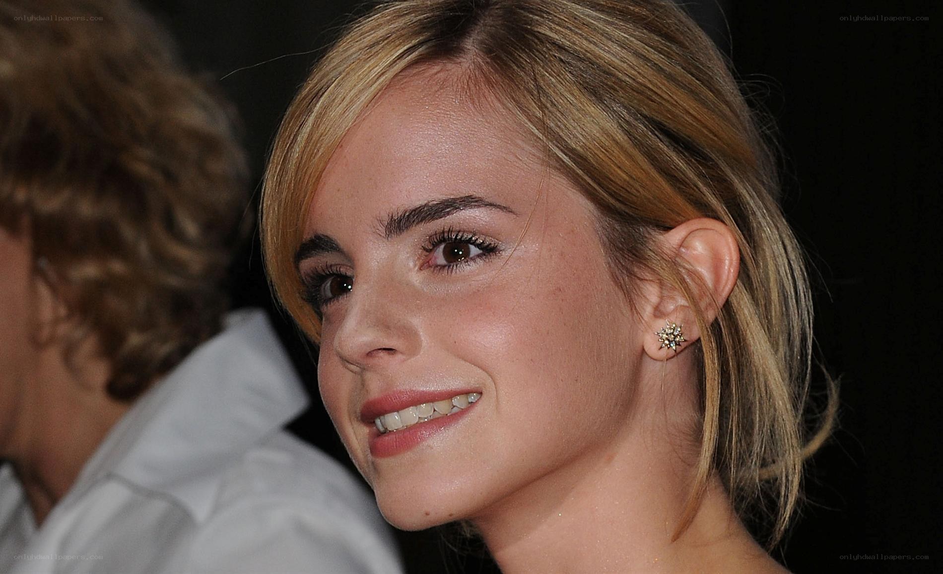 Emma Watson smiling at event