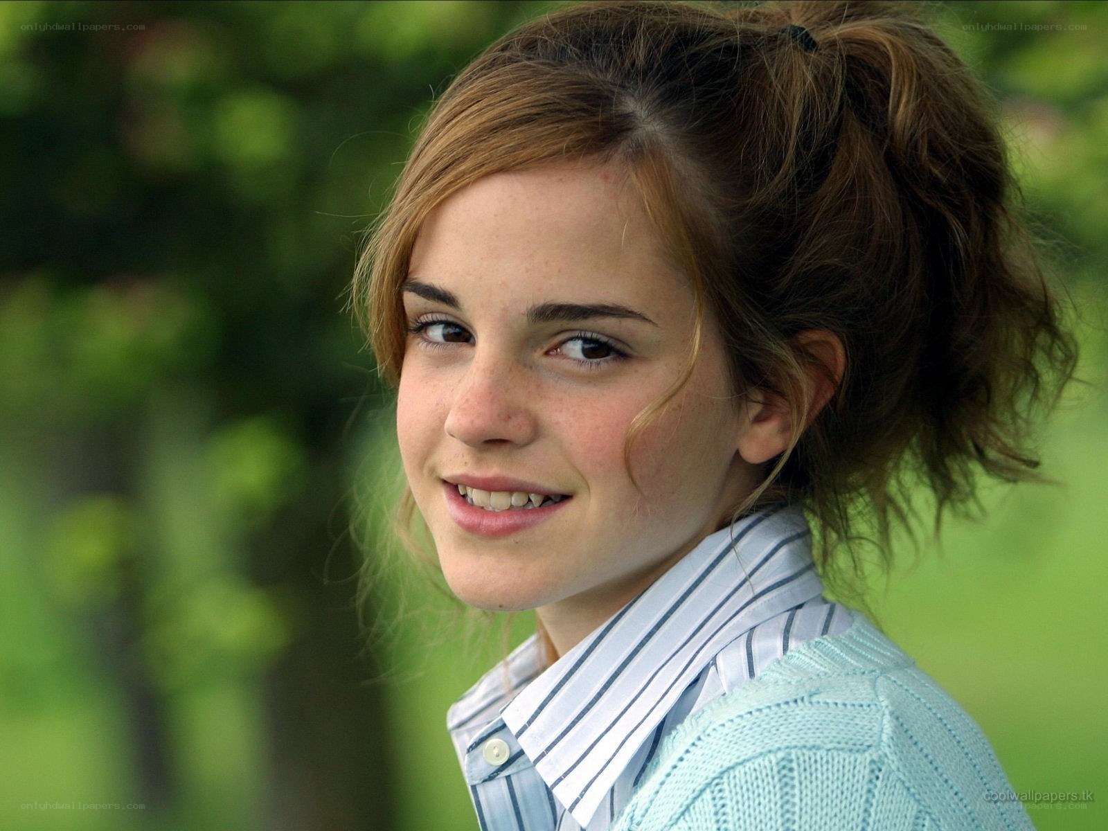 Emma Watson smiling outdoors
