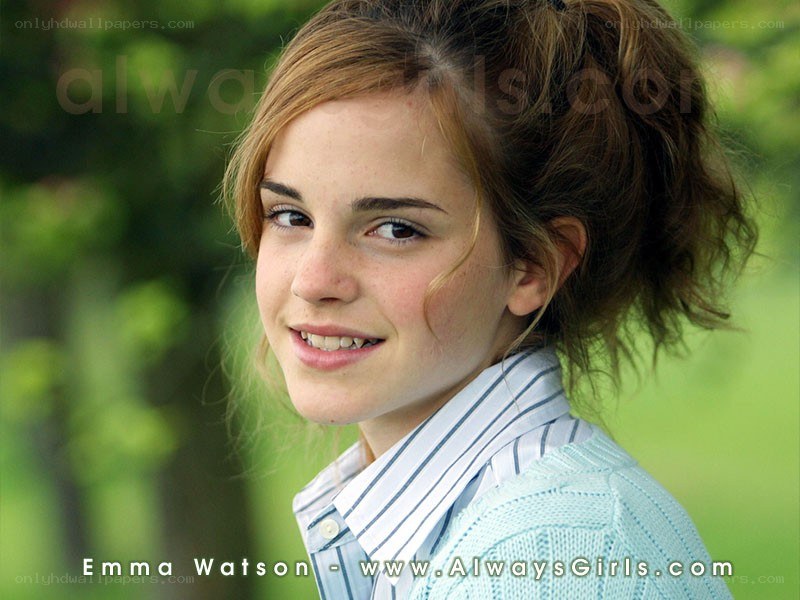 Emma Watson smiling outdoors