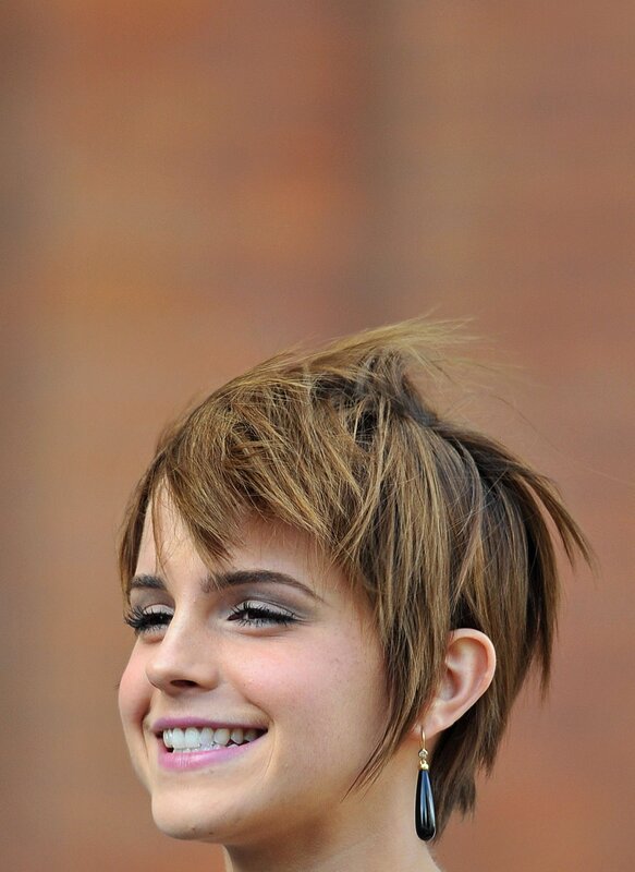 Emma Watson smiling with short hair