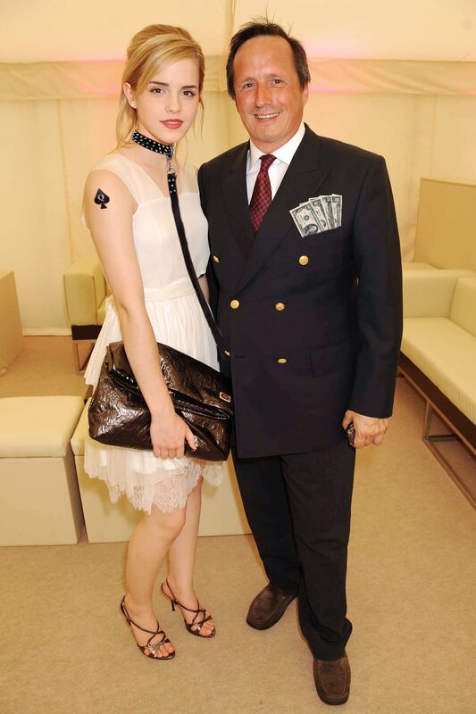 Emma Watson with man at event