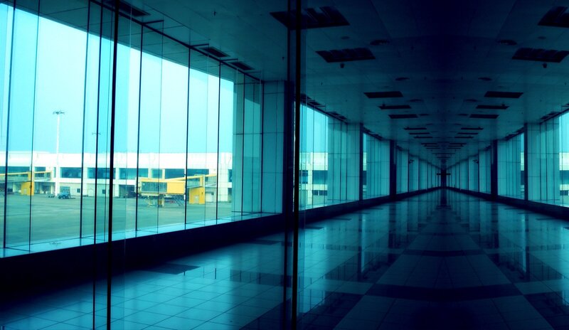 Empty airport terminal corridor